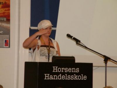 Bodil fra region 10 gør honør på talerstolen
